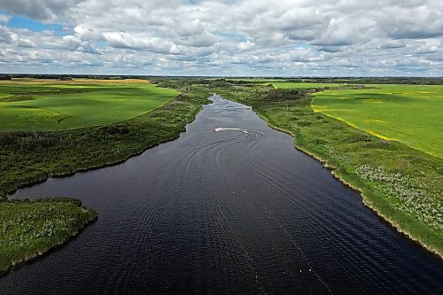 05082024
An aerial view of the thin, small body of water surrounded by prairie where world-class ski jumper Casey Mommer trains in Westman. Mommer, who grew up training at some of the best waterski training areas in the world, namely in Florida, now trains to compete at the top of his sport on the Manitoba prairie. (Tim Smith/The Brandon Sun)