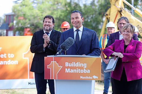 Flanked by Sport, Culture, Heritage and Tourism Minister Glen Simard, Brandon Mayor Jeff Fawcett, and Transportation and infrastructure Minister Lisa Naylor, Manitoba Premier Wab Kinew announces $9.7 million to resurface 18th Street from Aberdeen Avenue to Rosser Avenue,during a press conference outside Brandon University on Tuesday at noon. Brandon's 18th Street was voted Manitoba's worst road earlier this year via CAA's 2024 Worst Roads campaign. (Matt Goerzen/The Brandon Sun)