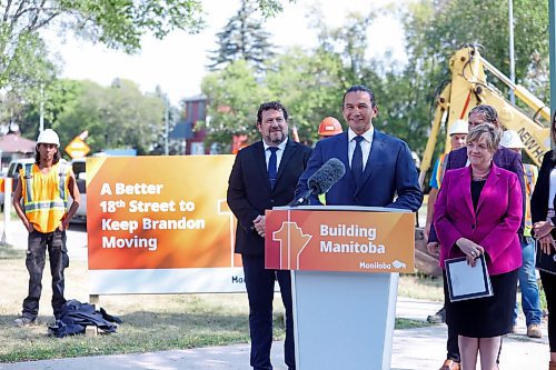 Flanked by Sport, Culture, Heritage and Tourism Minister Glen Simard, Brandon Mayor Jeff Fawcett and Transportation and infrastructure Minister Lisa Naylor, Manitoba Premier Wab Kinew announces $9.7 million to resurface 18th Street from Aberdeen to Rosser avenues during a press conference outside Brandon University on Tuesday. (Matt Goerzen/The Brandon Sun)