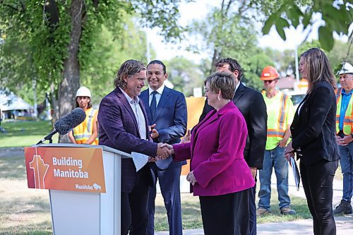 Following his address to those assembled on the Brandon University campus just off 18th Street, Brandon Mayor Jeff Fawcett shakes the hand of Manitoba Transportation and Infrastructure Minister Lisa Naylor on Tuesday at noon. Naylor, along with Manitoba Premier Wab Kinew and Brandon East MLA Glen Simard announced $9.7 million in funding to to resurface 18th Street between Aberdeen Avenue and Rosser Avenue. (Matt Goerzen/The Brandon Sun)