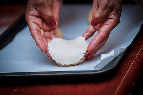 JOHN WOODS / WINNIPEG FREE PRESS
Dylan Gomez, his partner Rydell Enns, and his mother Liliana make some conchas in their kitchen in Winnipeg Tuesday, September 3, 2024. Gomez who learnt how to make the latin american sweet bread breakfast treat from his grandmother and mother sells the creations through his company Concha Craze.

Re: dave