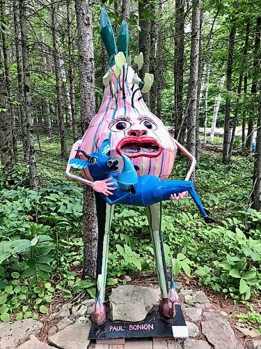 JEN ZORATTI / FREE PRESS
"Paul Bonion," painted-steel sculpture by Wisconsin artist Bill Reid, is one of many delights planted in the the sculpture garden at Edgewood Orchard Galleries. 