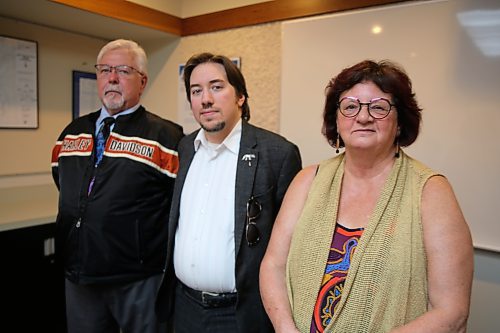 Outgoing vice chair Jim Murray (from left), new vice chair Duncan Ross and re-elected chair Linda Ross take a picture after the inaugural meeting held on Tuesday. (Abiola Odutola/The Brandon Sun)