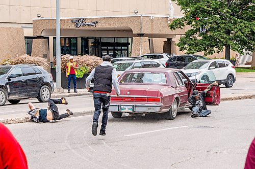 NIC ADAM / FREE PRESS
A man drove his vehicle through the protest blocking traffic at Portage and Main on Wednesday about 20 minutes after it began, striking a protester and dragging her bike under his car.
240904 - Wednesday, September 04, 2024.

Reporter: Nicole
