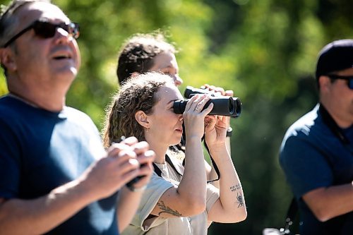 MIKAELA MACKENZIE / WINNIPEG FREE PRESS

Ashley Huot looks through her binoculars during the University of Manitoba Indigenous Birding Club&#x573; weekly birding walk on Friday, Aug. 30, 2024. 

For Eva story.
Winnipeg Free Press 2024