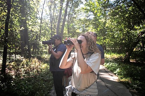 MIKAELA MACKENZIE / WINNIPEG FREE PRESS

Ashley Huot looks through her binoculars during the University of Manitoba Indigenous Birding Club&#x573; weekly birding walk on Friday, Aug. 30, 2024. 

For Eva story.
Winnipeg Free Press 2024