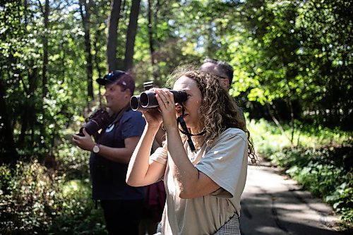 MIKAELA MACKENZIE / WINNIPEG FREE PRESS

Ashley Huot looks through her binoculars during the University of Manitoba Indigenous Birding Club&#x573; weekly birding walk on Friday, Aug. 30, 2024. 

For Eva story.
Winnipeg Free Press 2024