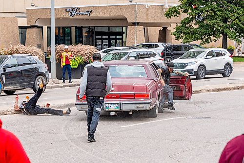 NIC ADAM / FREE PRESS
A man drove his vehicle through the protest blocking traffic at Portage and Main on Wednesday about 20 minutes after it began, striking a protester and dragging her bike under his car.
240904 - Wednesday, September 04, 2024.

Reporter: Nicole
