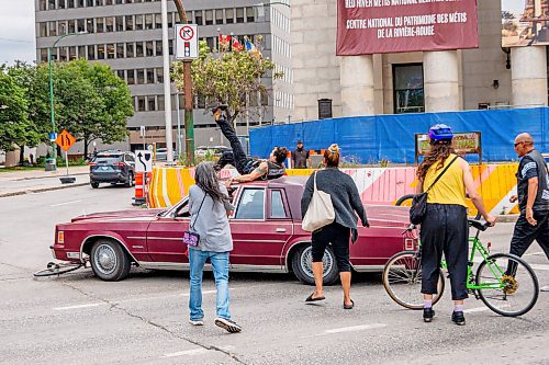 NIC ADAM / FREE PRESS
A man drove his vehicle through the protest blocking traffic at Portage and Main on Wednesday about 20 minutes after it began, striking a protester and dragging her bike under his car.
240904 - Wednesday, September 04, 2024.

Reporter: Nicole
