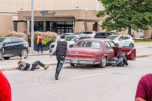 NIC ADAM / FREE PRESS
A man drove his vehicle through the protest blocking traffic at Portage and Main on Wednesday about 20 minutes after it began, striking a protester and dragging her bike under his car.
240904 - Wednesday, September 04, 2024.

Reporter: Nicole
