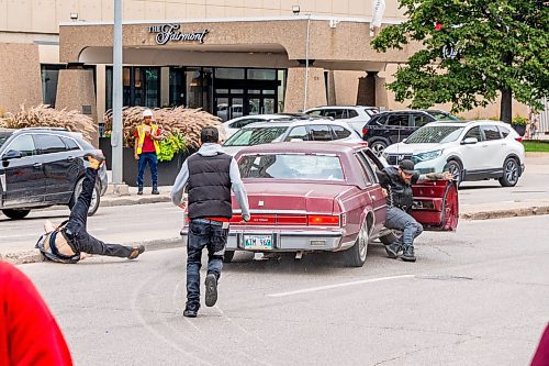 NIC ADAM / FREE PRESS
A man drove his vehicle through the protest blocking traffic at Portage and Main on Wednesday about 20 minutes after it began, striking a protester and dragging her bike under his car.
240904 - Wednesday, September 04, 2024.

Reporter: Nicole
