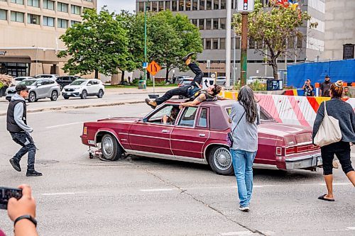 NIC ADAM / FREE PRESS
A man drove his vehicle through the protest blocking traffic at Portage and Main on Wednesday about 20 minutes after it began, striking a protester and dragging her bike under his car.
240904 - Wednesday, September 04, 2024.

Reporter: Nicole
