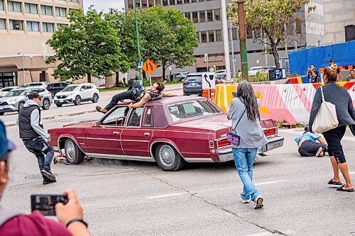 NIC ADAM / FREE PRESS
A man drove his vehicle through the protest blocking traffic at Portage and Main on Wednesday about 20 minutes after it began, striking a protester and dragging her bike under his car.
240904 - Wednesday, September 04, 2024.

Reporter: Nicole
