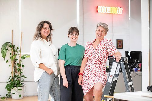 MIKAELA MACKENZIE / WINNIPEG FREE PRESS

Co-executive director Shawna Dempsey (right) and curators Jenny Western (left) and Abigail Auld at the new exhibition celebrating four decades of visual art education, community building, and peer support at Mentoring Artists for Women&#x573; Art (MAWA) on Wednesday, Sept. 4, 2024. 

For arts story.
Winnipeg Free Press 2024