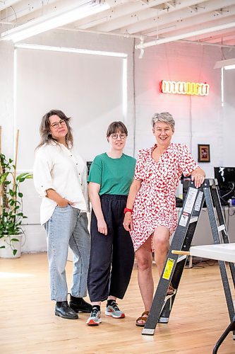 MIKAELA MACKENZIE / WINNIPEG FREE PRESS

Co-executive director Shawna Dempsey (right) and curators Jenny Western (left) and Abigail Auld at the new exhibition celebrating four decades of visual art education, community building, and peer support at Mentoring Artists for Women&#x573; Art (MAWA) on Wednesday, Sept. 4, 2024. 

For arts story.
Winnipeg Free Press 2024