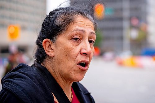 NIC ADAM / FREE PRESS
Lori Bateman, sister of Tammy Bateman the Indigenous woman who was struck and killed by a police vehicle at a homeless encampment, speaks to press at the protest involving about 50 people who shut down the intersection at Portage and Main early Wednesday afternoon.
240904 - Wednesday, September 04, 2024.

Reporter: Nicole