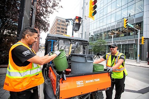 MIKAELA MACKENZIE / WINNIPEG FREE PRESS

Downtown Winnipeg BIZ Enviro Team members Jeremy Roulette (left) and Jim Main clean trash up at the corner of Carlton and Graham on Wednesday, Sept. 4, 2024. 

For Malak story.
Winnipeg Free Press 2024