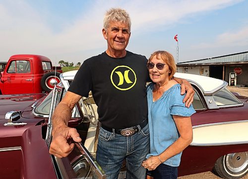 Gord and Debby Falk stand in front of their 1958 Ford Edsel Corsair. (Michele McDougall/The Brandon Sun)