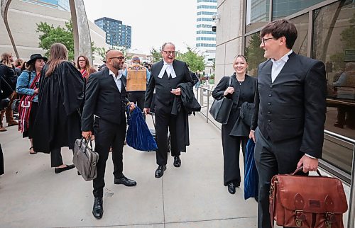 Ruth Bonneville / Free Press

LOCAL - Courts CFS Metis

Murray Trachtenberg (centre) and affiliates with the MMF Legal Counsel, are all smiles as they prepare to enter the Law Courts building with MMF members in advance of CFS settlement proceedings Thursday.  

MMF president, David Chartrand and others with the MMF follow the counsel inside the courts house.

The Manitoba Mtis Federation (MMF) hold pre-court ceremony and prayers in advance of the anticipated approval of the settlement for the Red River Mtis Child and Family Services class action in front of the LawCourts Building Thursday. 


Sept 5th,  2024