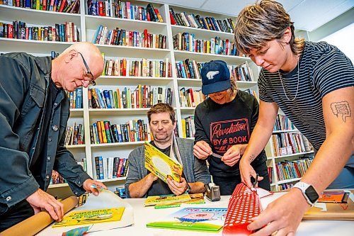 NIC ADAM / FREE PRESS
Executive Director Aiden Enns, literacy instructor John Samson Fellows, volunteer Christine Fellows, and Literacy Coordinator Anna Sigrithur (from left) for an assembly line, putting together children&#x2019;s books for their recorded stories program.
240905 - Thursday, September 05, 2024.

Reporter: Ben Waldman