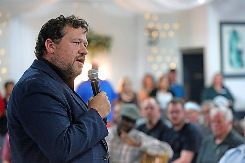 Brandon East NDP MLA Glen Simard answers a question from the audience during a public townhall meeting at The Backyard on Aberdeen late Thursday afternoon. (Matt Goerzen/The Brandon Sun)