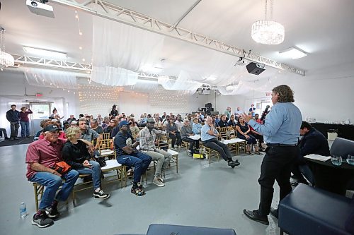 Brandon Mayor Jeff Fawcett answers a question from the audience during a public townhall meeting he held with Brandon East NDP MLA Glen Simard late Thursday at The Backyard on Aberdeen. (Matt Goerzen/The Brandon Sun)