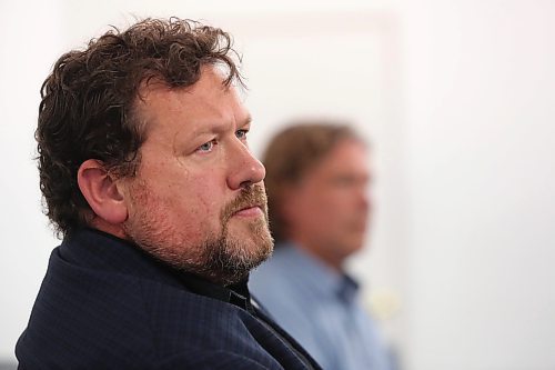 Brandon East NDP MLA Glen Simard listens to a question from the audience during a public townhall meeting he held with Brandon Mayor Jeff Fawcett at The Backyard on Aberdeen late Thursday afternoon. (Matt Goerzen/The Brandon Sun)