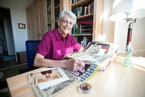 MIKAELA MACKENZIE / WINNIPEG FREE PRESS

Carol Briggs, one of the first female RCMP officers, goes through memorabilia from her time in the force on Friday, Aug. 30, 2024. The RCMP is celebrating 50 years since the first female RCMP officers graduated from their program.

For Jura story.
Winnipeg Free Press 2024