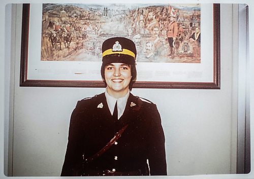 MIKAELA MACKENZIE / WINNIPEG FREE PRESS

A photo of Carol Briggs, one of the first female RCMP officers, from 1975 (just after she&#x564; completed her training) on Friday, Aug. 30, 2024. The RCMP is celebrating 50 years since the first female RCMP officers graduated from their program.

For Jura story.
Winnipeg Free Press 2024