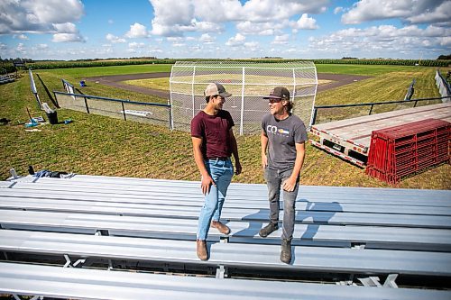 MIKAELA MACKENZIE / WINNIPEG FREE PRESS

Jace Guilford (left) and Joe Gardiner at the Field of Dreams baseball diamond near Clearwater, Manitoba on Thursday, Sept. 5, 2024. 

For Mike McIntyre story.
Winnipeg Free Press 2024