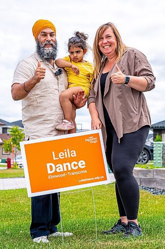 NIC ADAM / FREE PRESS
NDP Leader Jagmeet Singh, his youngest daughter, and NDP candidate Leila Dance (from left), set up campaign signs in Peguis Friday for the upcoming Elmwood-Transcona byelection.
240809 - Friday, August 09, 2024.

Reporter: Aaron