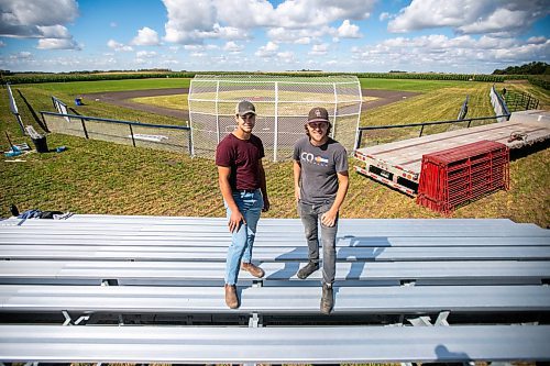 MIKAELA MACKENZIE / WINNIPEG FREE PRESS

Jace Guilford (left) and Joe Gardiner at the Field of Dreams baseball diamond near Clearwater, Manitoba on Thursday, Sept. 5, 2024. 

For Mike McIntyre story.
Winnipeg Free Press 2024