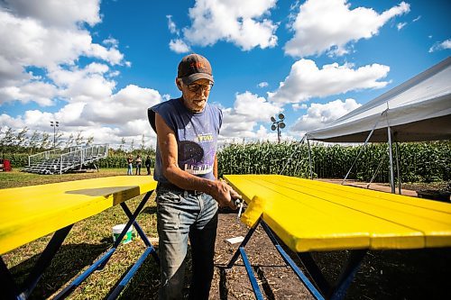 MIKAELA MACKENZIE / WINNIPEG FREE PRESS

Sven Conquist paints tables at the Field of Dreams baseball diamond near Clearwater, Manitoba on Thursday, Sept. 5, 2024. 

For Mike McIntyre story.
Winnipeg Free Press 2024