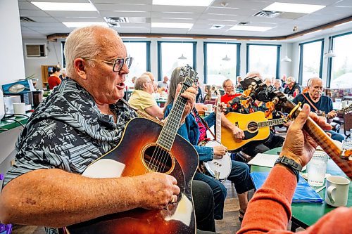 NIC ADAM / FREE PRESS
Harry McKay plays his guitar at lively bluegrass jam Friday morning in the Lake Trail Family Restaurant in Anola, MB.
240906 - Friday, September 06, 2024.

Reporter: ?