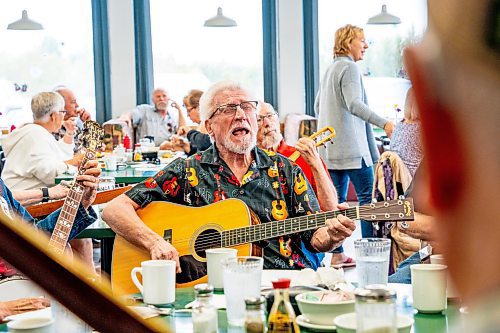 NIC ADAM / FREE PRESS
Paul Picard plays his guitar at lively bluegrass jam Friday morning in the Lake Trail Family Restaurant in Anola, MB.
240906 - Friday, September 06, 2024.

Reporter: ?