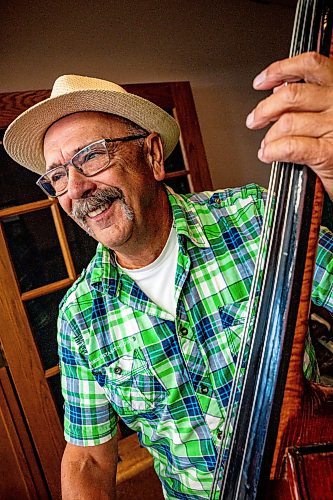 NIC ADAM / FREE PRESS
Don Wiebe plays the double bass at a lively bluegrass jam Friday morning in the Lake Trail Family Restaurant in Anola, MB.
240906 - Friday, September 06, 2024.

Reporter: ?