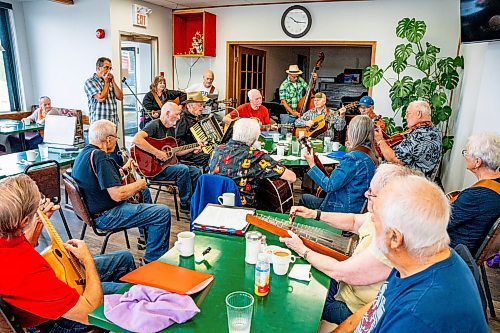 NIC ADAM / FREE PRESS
A group of seniors have been holding a lively bluegrass jam every Friday morning in Anola, for close to 25 years. The group - as many as 15 - gather for breakfast at 9 a.m., then start tuning up their instruments - guitar, banjo, mandolin, stand-up bass - around 9:30. 
240906 - Friday, September 06, 2024.

Reporter: ?