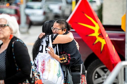 MIKAELA MACKENZIE / WINNIPEG FREE PRESS

Louise Menow, friend of William Ahmo (right), is embraced outside of the law courts on Friday, Sept. 6, 2024. 

For Chris story.
Winnipeg Free Press 2024