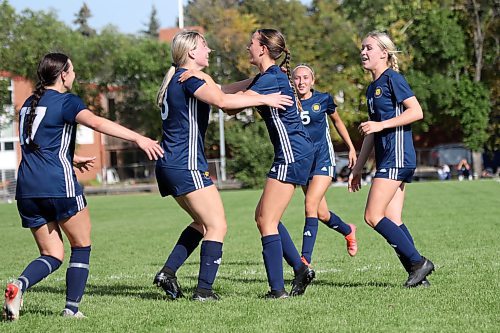 Mackenzie Boyes, second from left, and Reegan Garnhum scored Brandon University's goals in its 2-1 win over Providence to open the MCAC women's soccer season at the Healthy Living Centre field on Saturday. (Thomas Friesen/The Brandon Sun)