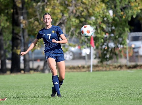 Reegan Garnhum passes down the sideline during the second half. (Thomas Friesen/The Brandon Sun)