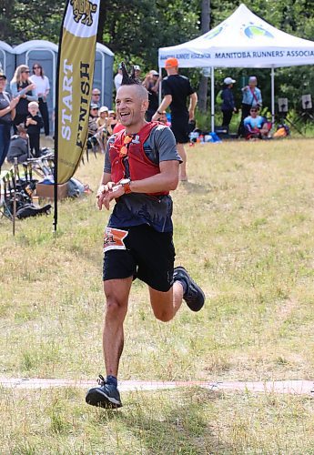 Aaron Webb of Winnipeg crosses the finish line in four hours 34 minutes 52.33 seconds to capture the 50-km distance at the Race The North Face event at the Brandon Hills on Saturday morning. The annual trail run once again sold out as athletes raced 10, 25 and 50-km distances. He was followed by Holden Reich (4:50:43.51) and Nicholas Miller (4:53:29.42). Ashley Elliott won the women’s race in 4:59:20.14, followed by Alice Sherwin (5:03:26.23) and Chloe Bishop (5:22:17.68). In the 25-km race, Daniel Heschuk won in 1:38:10.50, while Jenna Cross took the women’s race in 2:17:10.09. In the 10-km event, Brett Morgan beat the other men in 45:03.66 while Kendra Froese won the women’s race in 58:38.70. (Perry Bergson/The Brandon Sun)
Sept 7, 2024