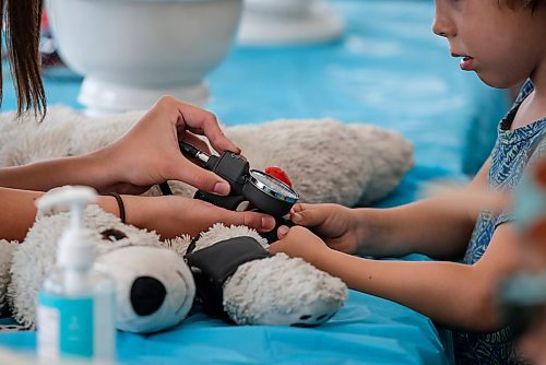 JOHN WOODS / FREE PRESS
A bear&#x2019;s blood pressure is checked at the Teddy Bears&#x2019; Picnic in Assiniboine Park  Sunday, September 8, 2024. 

Reporter: tyler