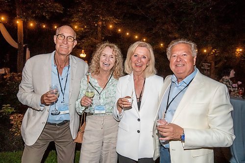 BROOK JONES / FREE PRESS
From Left: Bill Parrish and his wife Theresa Parrish, Deborah Waller and her husband Simon Waller are all smiles as they attend A Picnic in Provence - Garden Party 2024 at the Leo Mol Sculpture Garden at Assiniboine Park in Winnipeg, Man., Wednesday, Aug. 28, 2024. The annual fundraiser supports the Assiniboine Park Conservancy and this year's event included 500 guests.