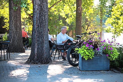 Ruth Bonneville / Free Press

Standup - Forks Weather shot

People gather to work and sip coffee on the lower level patio at the Forks with its scenic views of the docks along the Assiniboine River Monday morning.  

Sept 9th,  2024