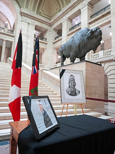 Ruth Bonneville / Free Press

Local - Merrick table Leg

A beautiful photo of AMC Chief, Cathy Merrick is set on a table along with another on an easel next to it along with two flags of Manitoba at the base of the grand staircase at the Legislative Building Monday.  The table is in preparation for a book of condolences for people to sign in the near future.  


Sept 9th,  2024