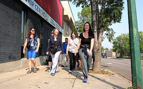 Emmy Sanderson (right) of Brandon Downtown BIZ hosts a two-kilometre walk through the downtown every Tuesday from 12:15 to 12:45 p.m., starting and ending at Princess Park on Princess Avenue and Eighth Street. (Michele McDougall/The Brandon Sun)