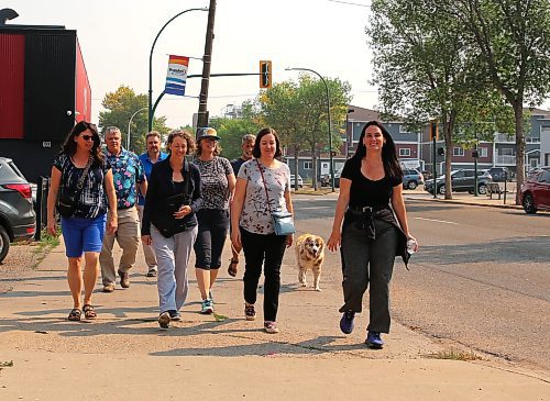 Emmy Sanderson (on right, in front) Brandon Downtown BIZ's executive director, hosts a 2-kilometre walk through the downtown every Tuesday from 12:15 - 12:45 p.m., starting and ending at Princess Park on Princess Avenue and 8th Street. (Michele McDougall/The Brandon Sun)