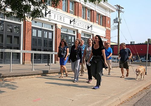 Emmy Sanderson (on right, in front) Brandon Downtown BIZ's executive director, hosts a 2-kilometre walk through the downtown every Tuesday from 12:15 - 12:45 p.m., starting and ending at Princess Park on Princess Avenue and 8th Street. (Michele McDougall/The Brandon Sun)