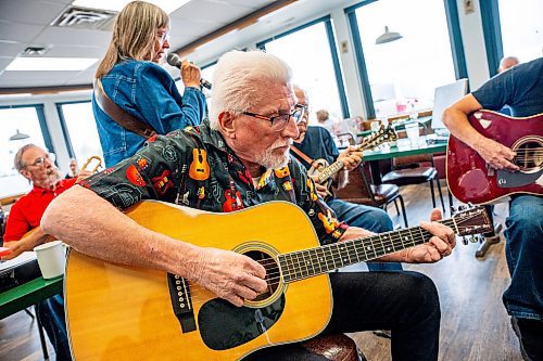 NIC ADAM / FREE PRESS
Paul Picard plays his guitar at lively bluegrass jam Friday morning in the Lake Trail Family Restaurant in Anola, MB.
240906 - Friday, September 06, 2024.

Reporter: ?