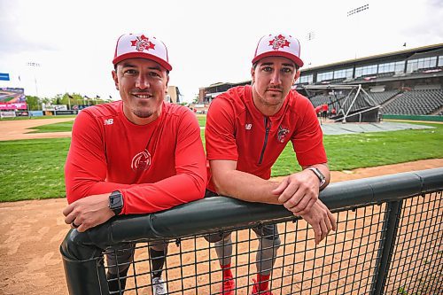 Mike Sudoma/Free Press
Manager Logan Watkins (left) and Pitcher Zac Reningen after batting practice prior to Wednesday evenings game against the Chicago Dogs 
May 22, 2024